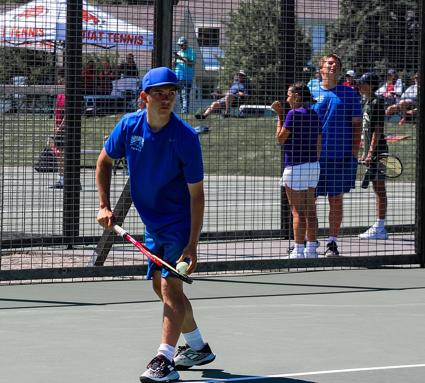 Soap Lake senior Xavier Ewing gets ready to serve the ball during the league tournament over the weekend.