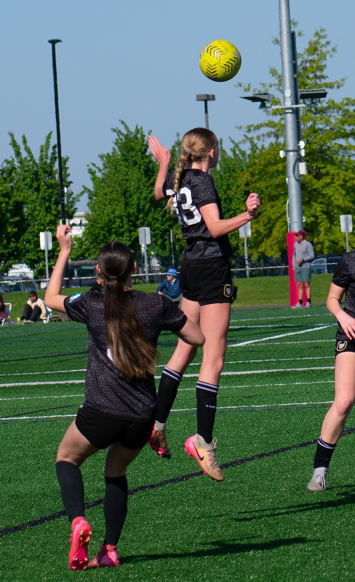 Photo by KARI HYNES
The Sting SC 2011 Girls Academy soccer team wrapped up its GA Aspire League season last week, finishing undefeated and securing a spot in the GA Aspire Nationals in June. In their final league match against Spokane Shadow, Olivia Hynes scored Sting’s lone goal. The Sting also competed in the Bill Eisenwinter Hot Shot Tournament last weekend, opening tournament play with a 1-0 loss to Indie Chicas. Sting responded Saturday afternoon with an 8-0 win over Flathead Valley United 07/08. Brightyn Gatten, Presley Moreau and Payton Brennan each scored for Sting, while Kate Keaggy added an assist. On Sunday, the Sting closed out tournament play with a 6-0 victory over Glacier Surf 10/11 Blue. Brightyn Gatten led the way with two goals, while Harper Overland, Kate Keaggy, and Kylie Lorona also found the back of the net. Payton Brennan contributed an assist. The girls now turn their attention to the Idaho State Cup semifinals in Boise, where they will face IFFDC 2011G. Pictured is Payton Brennan, soaring for a header.