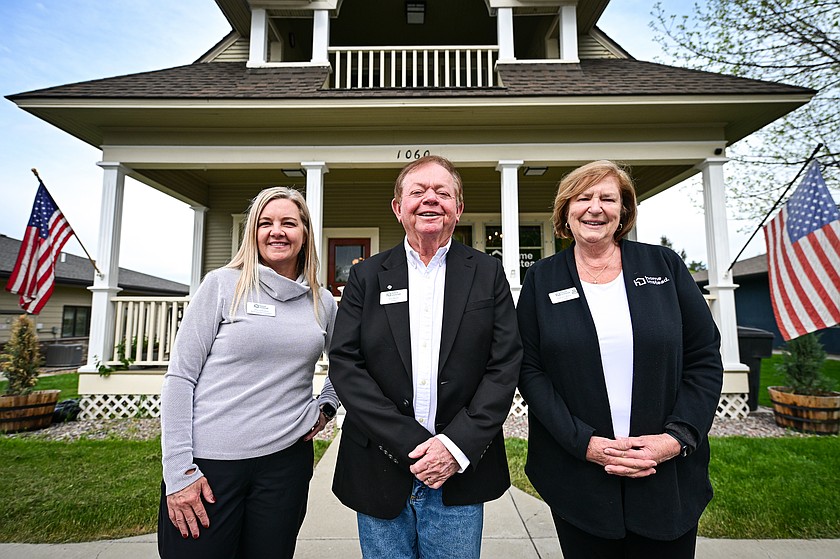 Owners Tony, center, and Ruth Ann Marchi, right, with business development advisor Jessica Redfield outside the Home Instead office on North Meridian Road in Kalispell on Wednesday, May 13. (Casey Kreider/Daily Inter Lake)
