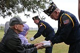 Markers, honors bestowed to veterans interred in Mica Peak Cemetery