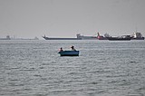 Tensions flare near Strait of Hormuz as a ship is seized and another is sunk