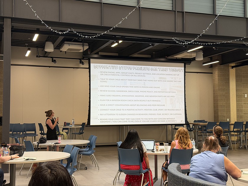 North Central Educational Service District Threat Assessment Coordinator Hunter McLeod leads the gang awareness town hall Wednesday at Vanguard Academy.