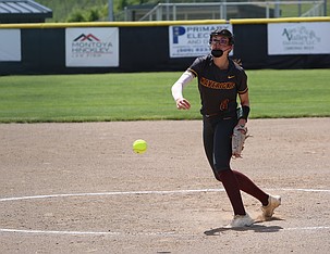 Caitlin Decubber (8) throws her next pitch against West Valley. The Mavericks suffered an 11-1 loss to the Rams in the district tournament Saturday, bringing an end to their season.