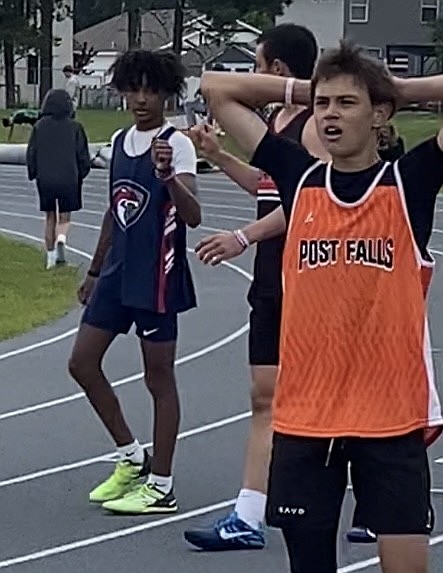 Courtesy photo
Angelo Brown, left, of Coeur d'Alene Charter Academy, shares a fist pump with MJ Stockton of Canfield Middle School after their race in the boys sixth and seventh grade 100-meter dash in the Large Middle School District Track Meet last Thursday at Lakeland High. Brown won in 12.55 seconds. Stockton was second in 12.73 and Liam Alvarado, right, of Post Falls was third at 13.28. All are seventh graders.