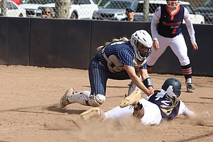 The Big Bend Community College Vikings’ Mady Morris, left, tags out a Treasure Valley player as she dives toward home plate. Morris was named to the NWAC’s All-Region first team as a catcher.