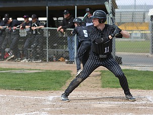 Nolan Grindy (11) steps up to bat for the Almira/Coulee-Hartline Warriors earlier this season. The Warriors earned a first-round bye in the 1B state tournament.