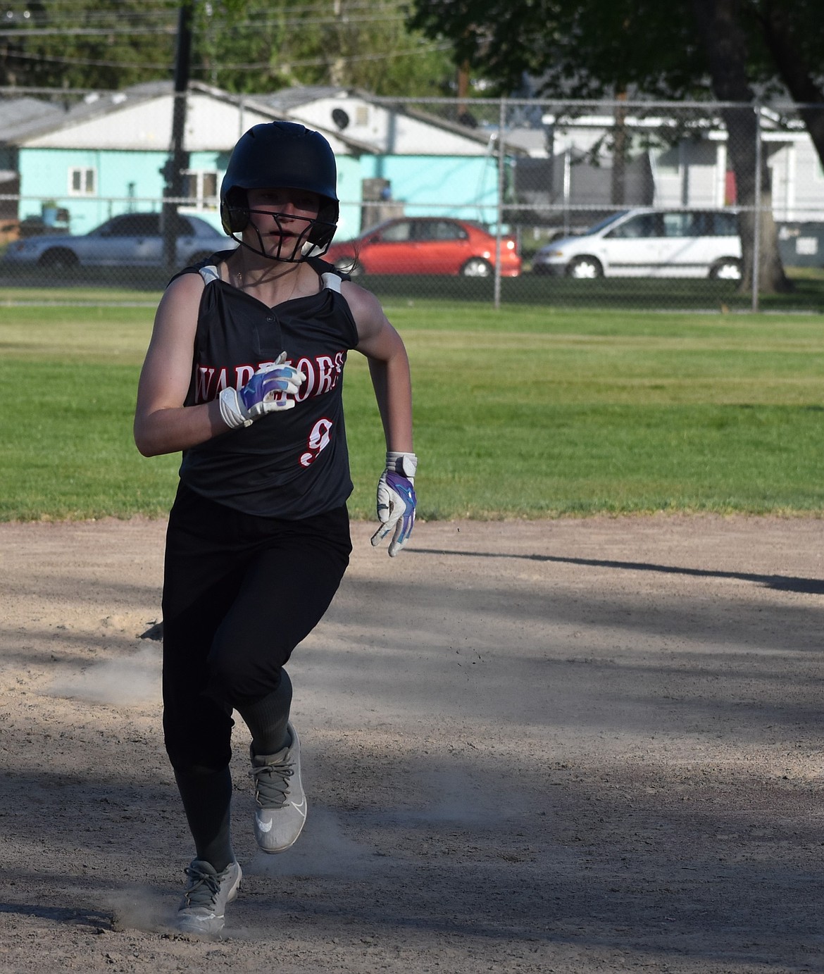 The Almira/Coulee-Hartline Warriors’ Josie Emerson (9) heads toward third base during a game earlier this season.