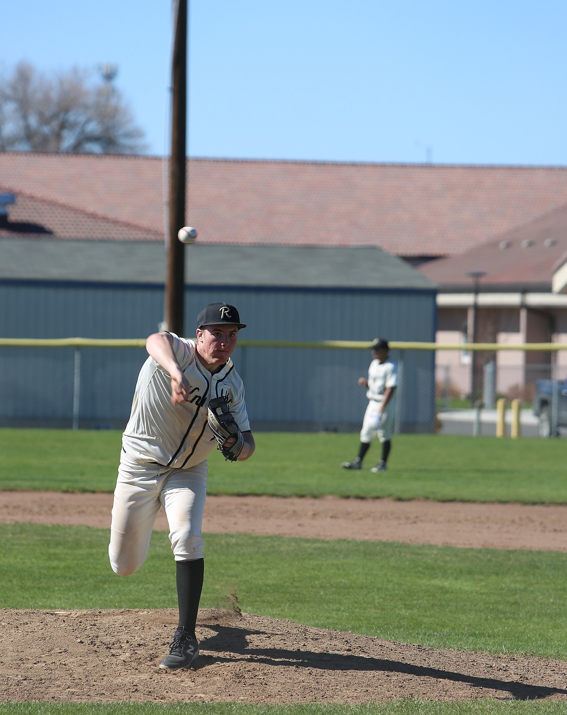 The Knights’ Ernie Weeks (15) unleashes his next pitch while on the mound for Royal earlier this season.