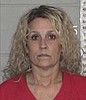 Woman faces charges after backing truck into Canyon Foods