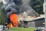 Fire destroys garage, damages house in Osburn