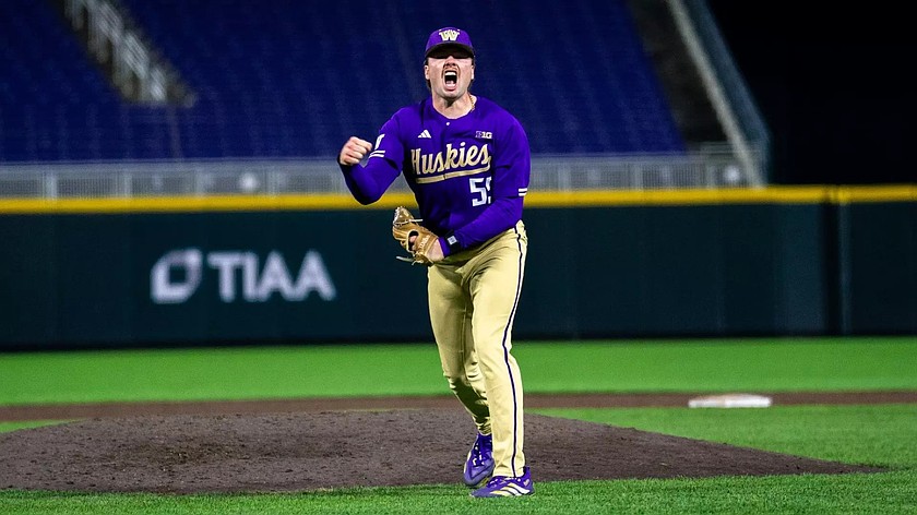 Tommy Brandenburg from the Huskies celebrates on the mound after closing out the ninth inning for a huge win.