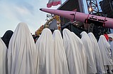 In Iran's capital, weapons demonstrations send a signal at home and abroad as threat of war remains