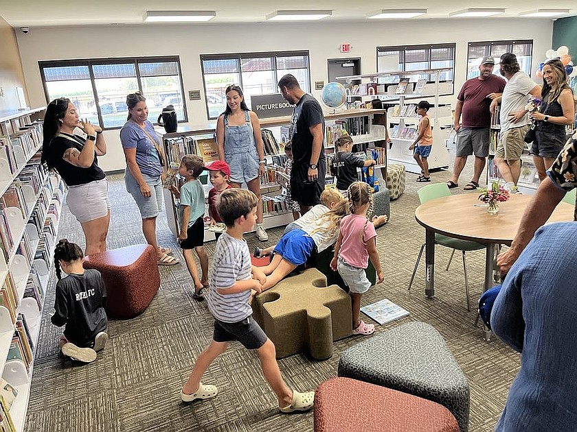 Patrons explore the Royal City Library.