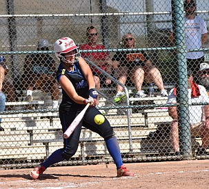 Amaya Erickson from the Cougars connects during the state tournament Friday afternoon.