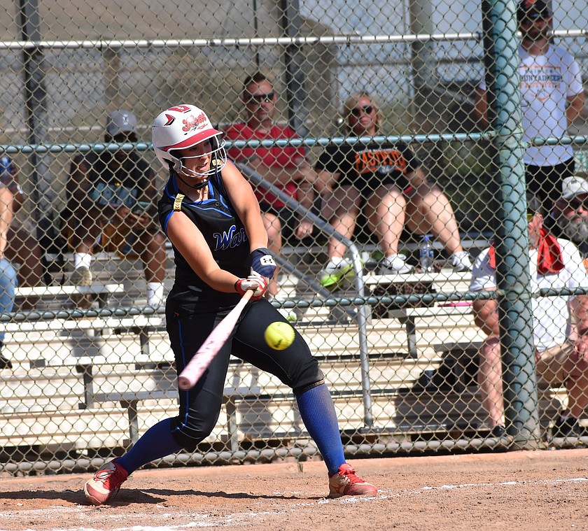 Amaya Erickson from the Cougars connects during the state tournament Friday afternoon.