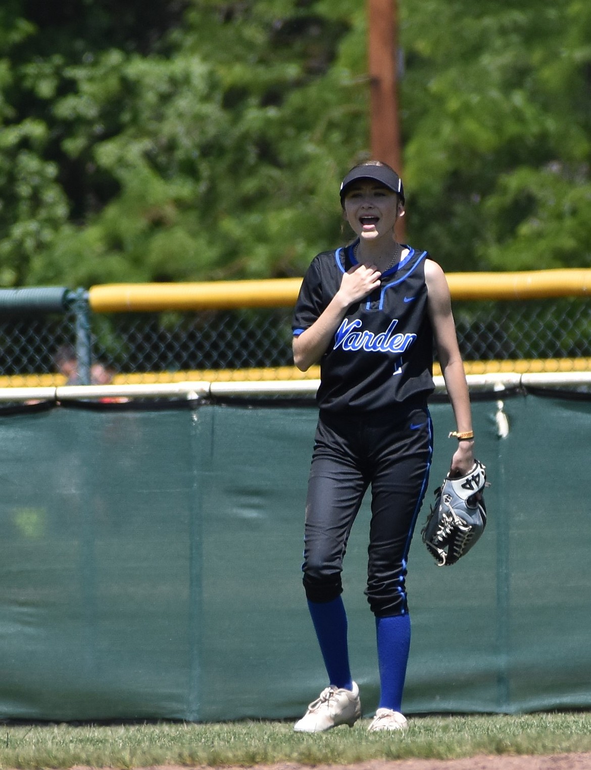 Gabby Pruneda from Warden calls out to her team from the outfield during Friday’s game against Napavine.