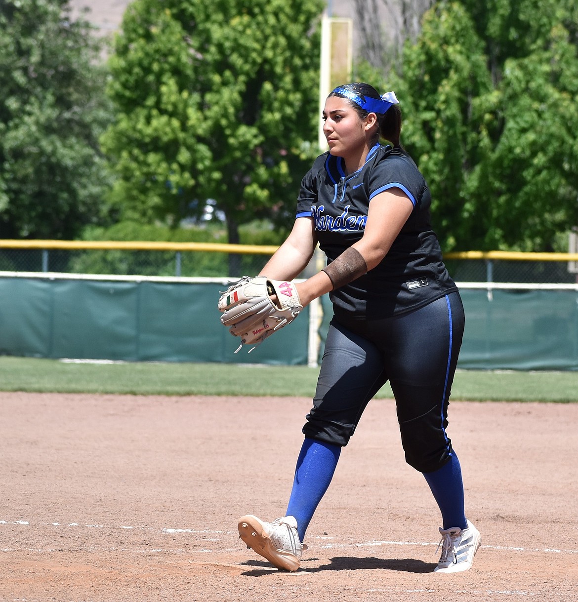 Cougars pitcher Jamylex Pruneda prepares to hurl the ball towards the opposing Napavine batter Friday in the state tournament.
