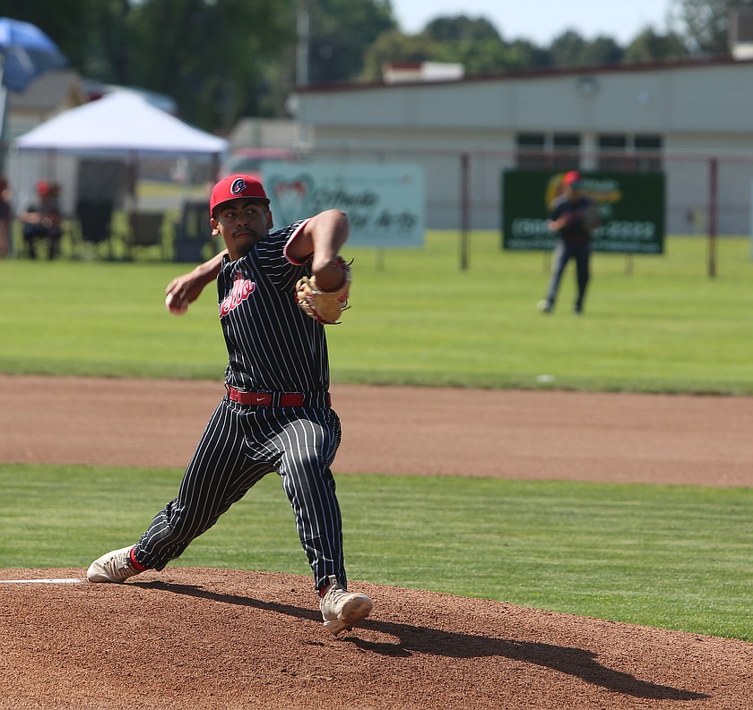 Xzyyvn Martinez (27) throws his next pitch against Chief Sealth in the opening round of the 2A state baseball tournament. The Huskies fell to the Selah Vikings 8-7 in the quarterfinals later that afternoon, concluding their season.