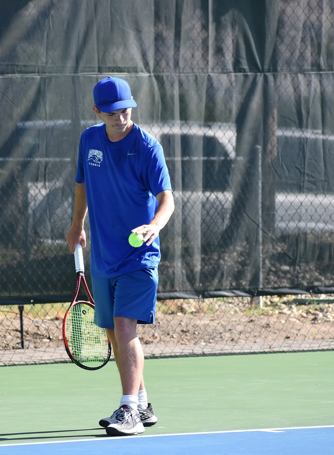 Eagles senior Xavier Ewing gets ready to serve the ball to his opponent over the weekend in the 1B State Tennis tourney.