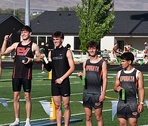 Jonah Hahn from Othello stands on the podium with Ephrata’s Maddax Iverson and Jacob Reyes after they all placed in the 110m hurdles.