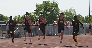 Moses Lake track athletes Isaac Gordon, Elijah Burns and Brady Jay sprint down the lane during a previous home meet this season. All three athletes qualified for state.