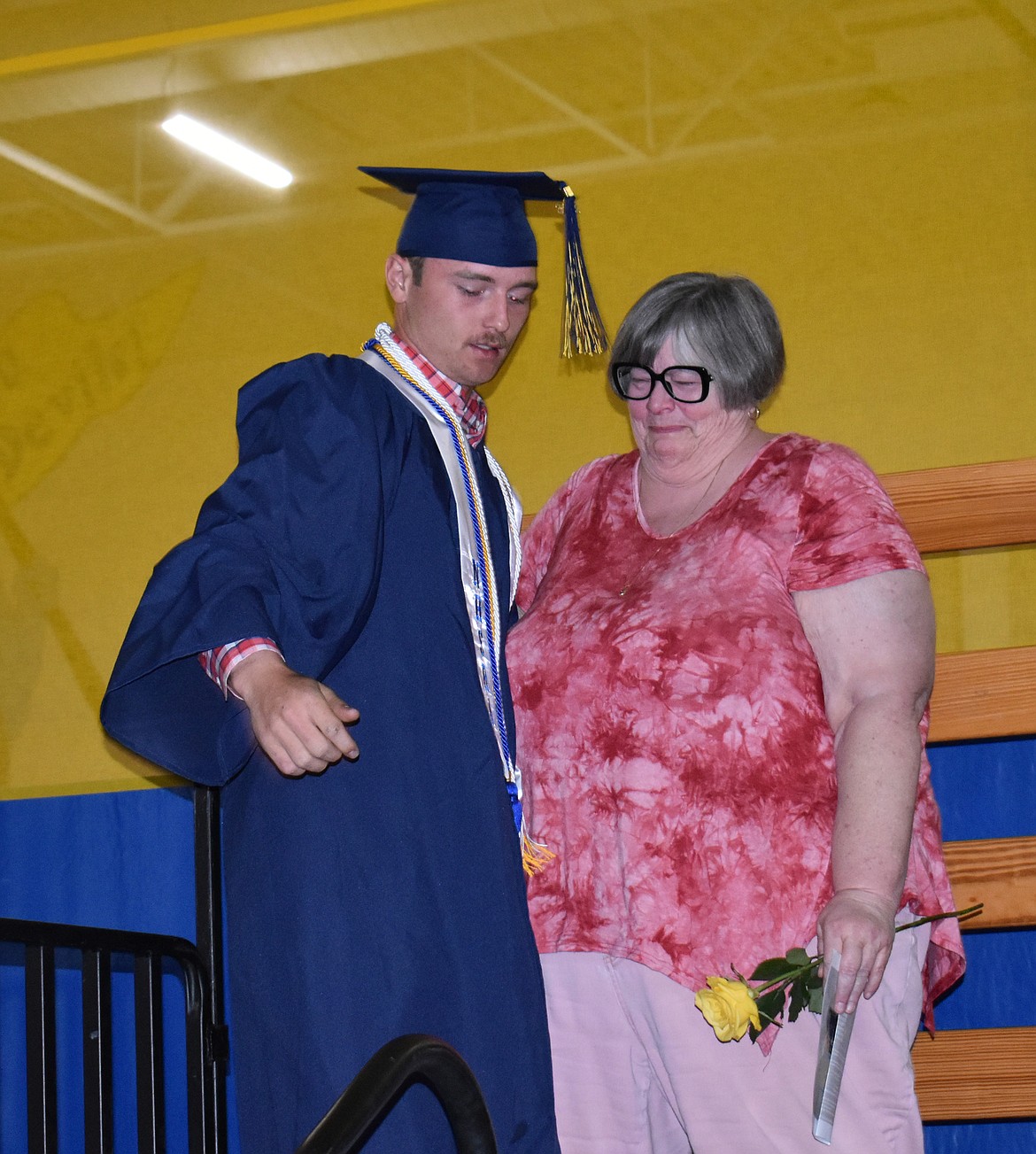 Wilson Creek High School senior Reece Kane recognizes business teacher Jackie Floetke, who retires this year after 42 years teaching at Wilson Creek.