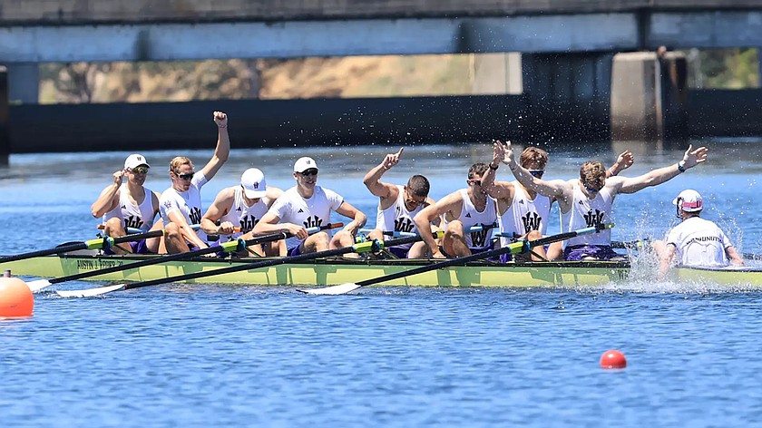 The UW men’s varsity eight rowing team celebrates as they cross the finish line to become national champions.