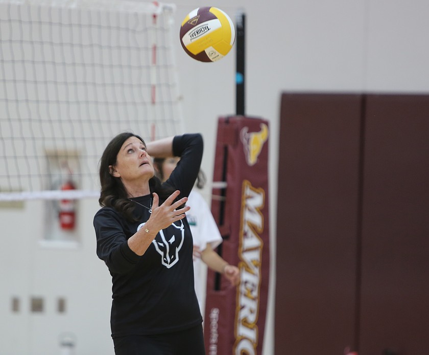 Mavericks Head Coach Krystal Trammell leads student athletes through a drill at voluntary summer workouts.