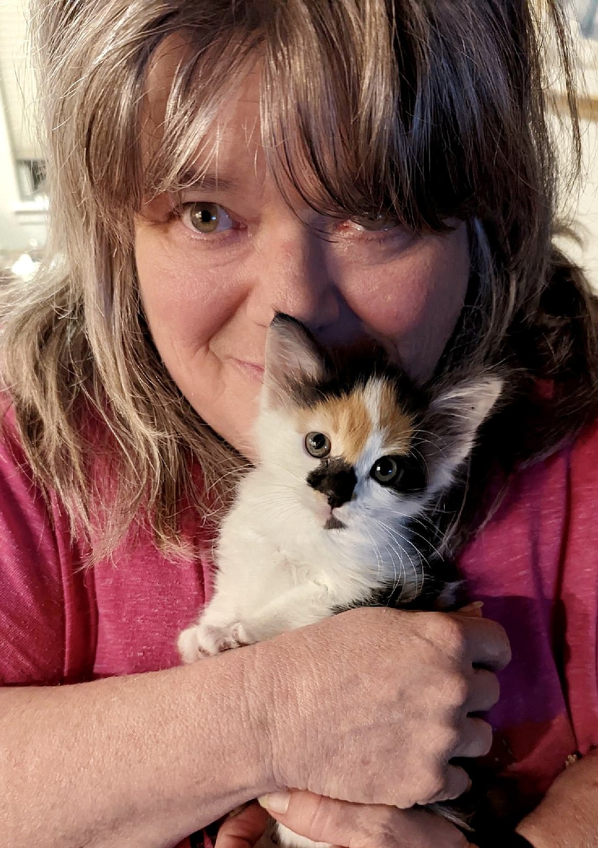 Maureen Dolan and kitten Meadow.