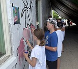 Community contributes to Ronan's "paint-by-number" mural