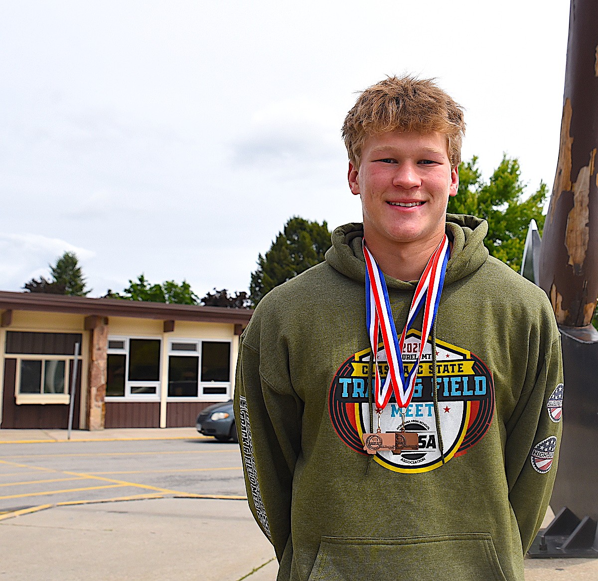 Libby's Farmer, Andersen double medalists at state track championships
