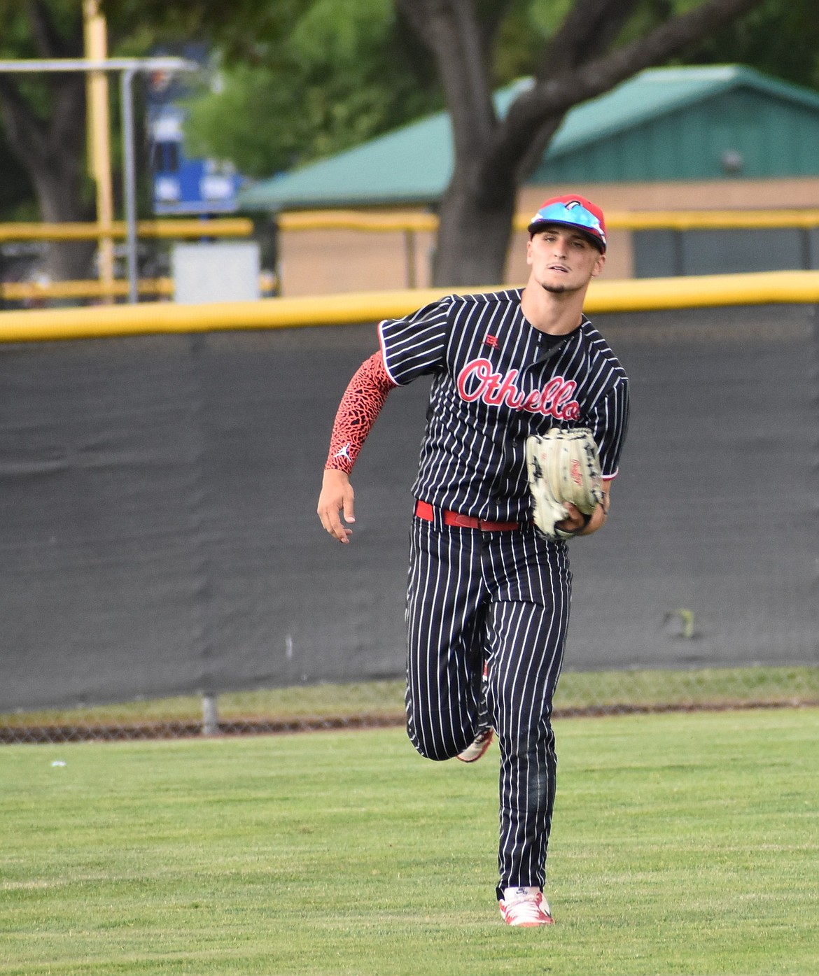 Othello’s RJay Garza, representing Team Yakima, makes a catch in the outfield for an out against Tri-Cities during the All-Star game Wednesday evening.
