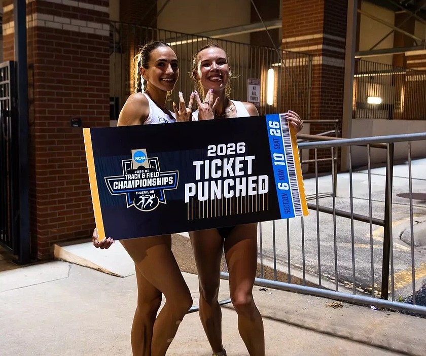 UW’s Julia David-Smith and Chloe Thomas take a photo together after they both qualified for the 5000m event at the NCAA Outdoor Championships.