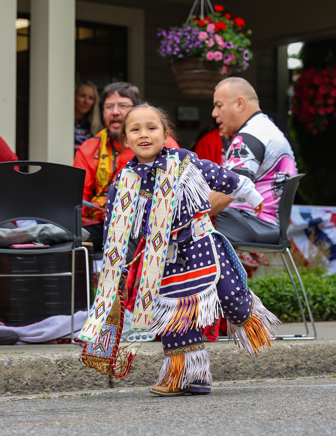 A younger dancer from the Coeur d'Alene Tribe moves in front of a crowd at The Early Years Historical Food Festival in Post Falls. The new festival took place May 30.
