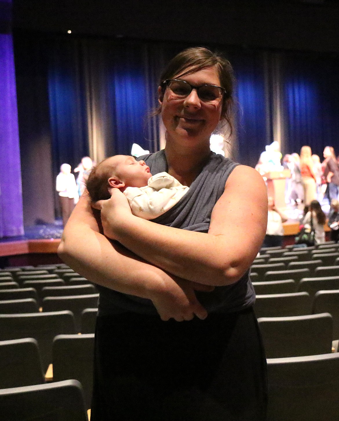 Emily Jesberger, with her newborn son, Noah, was one of the 40 women who received a $1,000 scholarship to North Idaho College.