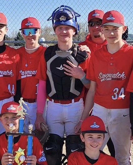 Courtesy photo
Cash Crateau, center, is an incoming freshman at Lakeland High, playing for the Sandpoint Sasquatch 14U club baseball team. At a Perfect Game tournament this past weekend near Seattle, Cash hit grand slams in three consecutive games and extended the streak to four consecutive games with a home run overall while helping lead the Sasquatch 14U to the championship game. For the season, he has a .526 batting average, 1.579 OPS, 8 home runs and 53 RBIs. As a pitcher, he has 66 strikeouts in 40 innings pitched, and a 1.925 ERA.