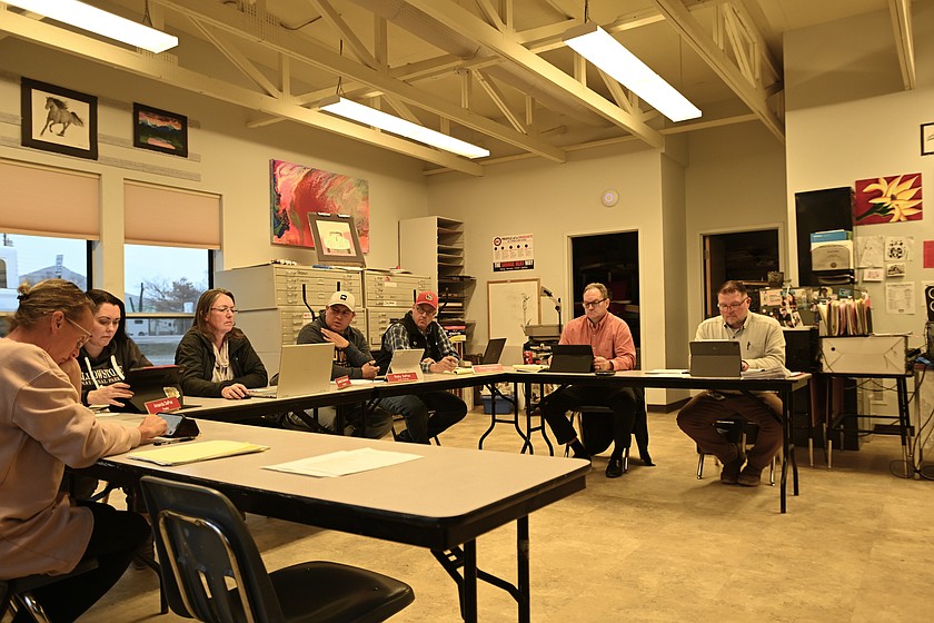 (Left to right) Hot Springs School Board Vice Chair Jennifer Christensen (new school board chair as of May 13, 2026), former Chair Ricky DePoe, Trustee Chuck Stephens, former Superintendent Gerald Chouinard and Clerk and Business Manager Bradley Pride gather in a school board meeting on March 11. (Hannah Shields/Daily Inter Lake)