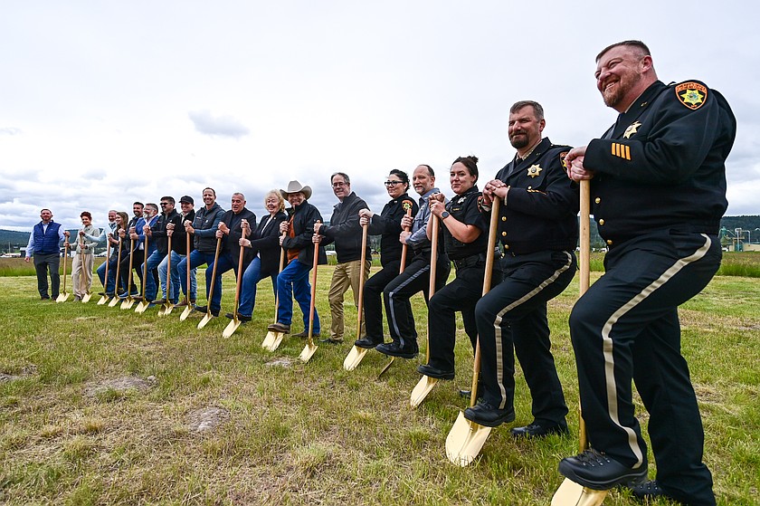 Flathead County officials hold shovels at a groundbreaking for the new public safety facility at 225 Snowline Lane on Wednesday, June 10. (Casey Kreider/Daily Inter Lake)