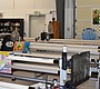A row of quilting machines at Country Fabrics. …