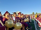 Caps fly through the wind as MLHS Class of 2026 graduates