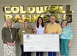 Coldwell Banker Schneidmiller Realty donates $60,000 to Schneidmiller House