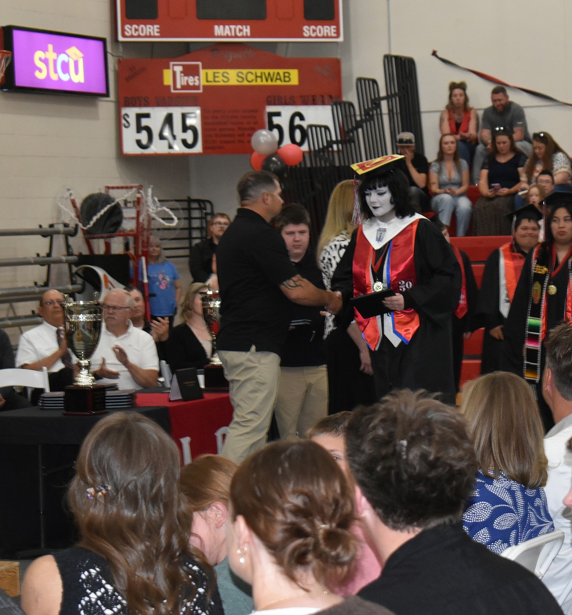 Erien Najera receives her diploma at the Lind-Ritzville High School graduation June 6.