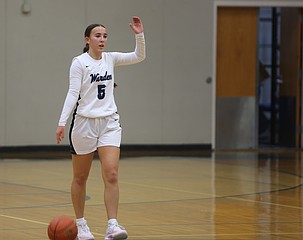 Amaya Erickson dribbles the basketball down the court during her senior season with the Warden Cougars. Erickson has a longtime love for the sport of basketball since elementary school.