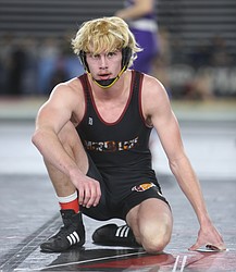 Ian Anderson takes a moment to catch his breath in between rounds at the 2026 Mat Classic in Tacoma. Anderson will be headed to Big Bend Community College to wrestle for the Vikings.