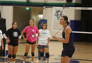 The Vikings’ Head Volleyball Coach Lindsey Linthicum (right) talks with attendees at last years summer camp. Her program will be hosting a day camp on June 26 for local Basin athletes.