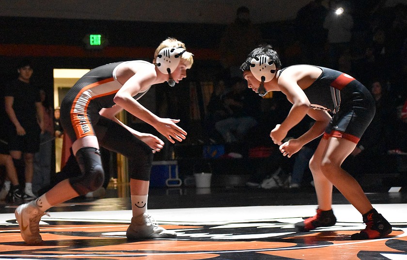 Ephrata wrestler Louden Leenhouts faces off against Othello’s Max Romero during the 2025/2026 winter wrestling season. The Tigers will be hosting a youth wrestling camp this summer.