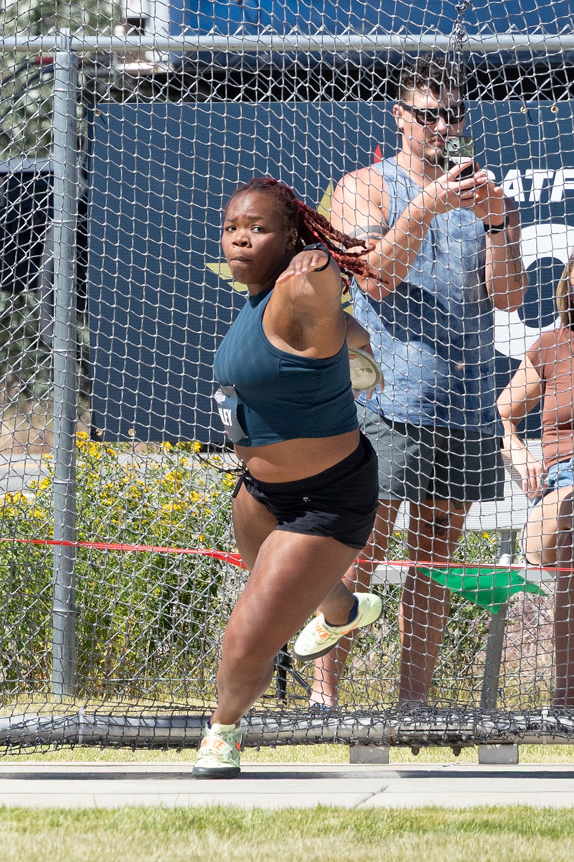 Photo by JERRY VICK
Veronica Fraley prepares to make her throw during the women's discus on the first day of the Iron Wood Throws Classic on Thursday at the Iron Wood Throws Center in Rathdrum. Fraley won the event with a throw of 205 feet, 1 inch.