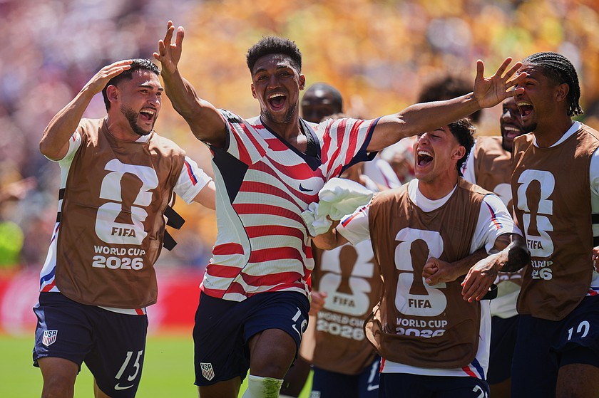 United States' Alex Freeman (16), second left, celebrates after scoring his side's second goal during the World Cup Group D soccer match between the United States and Australia in Seattle, Friday, June 19.