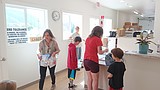 Food bank serving clients from new location