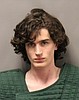 Shooting suspect scoped out library before returning with a shotgun and killing 2, police say